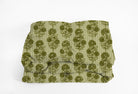 Floral and striped comforter in olive