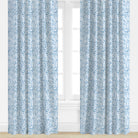 Coral patterned drapery panel in blue