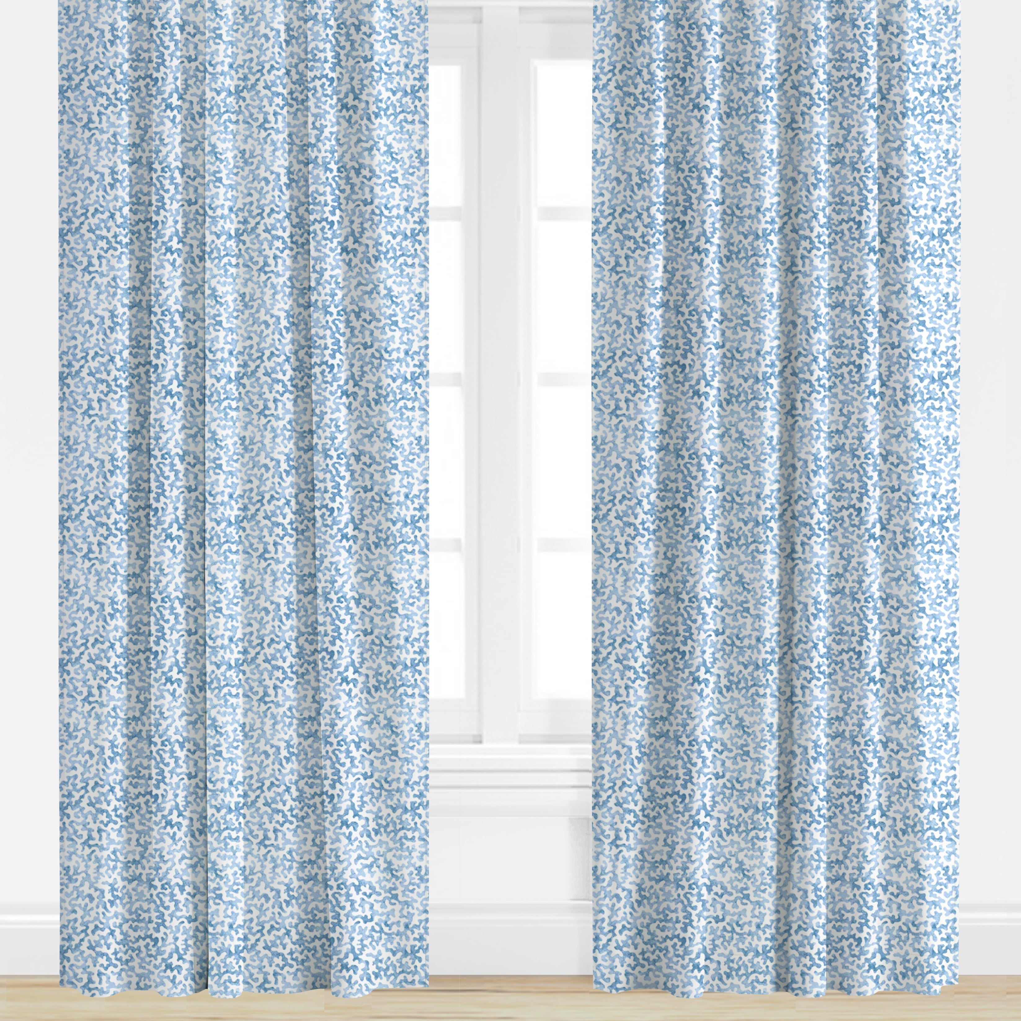 Coral patterned drapery panel in blue