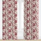 Floral patterned curtains in pink on a window with a white background