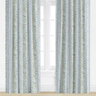 Floral patterned drapes in blue and green by Evelyn Henson