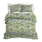Floral bedding set with blue, green and white pattern on a white background