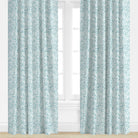 Coral patterned drapery panel in aqua