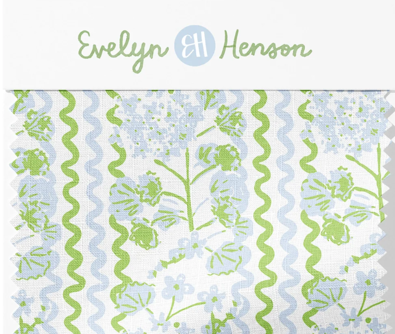 Patterned fabric with floral and wavy designs, branded 'Evelyn Henson'.