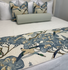 A bed footer with a flying ducks.