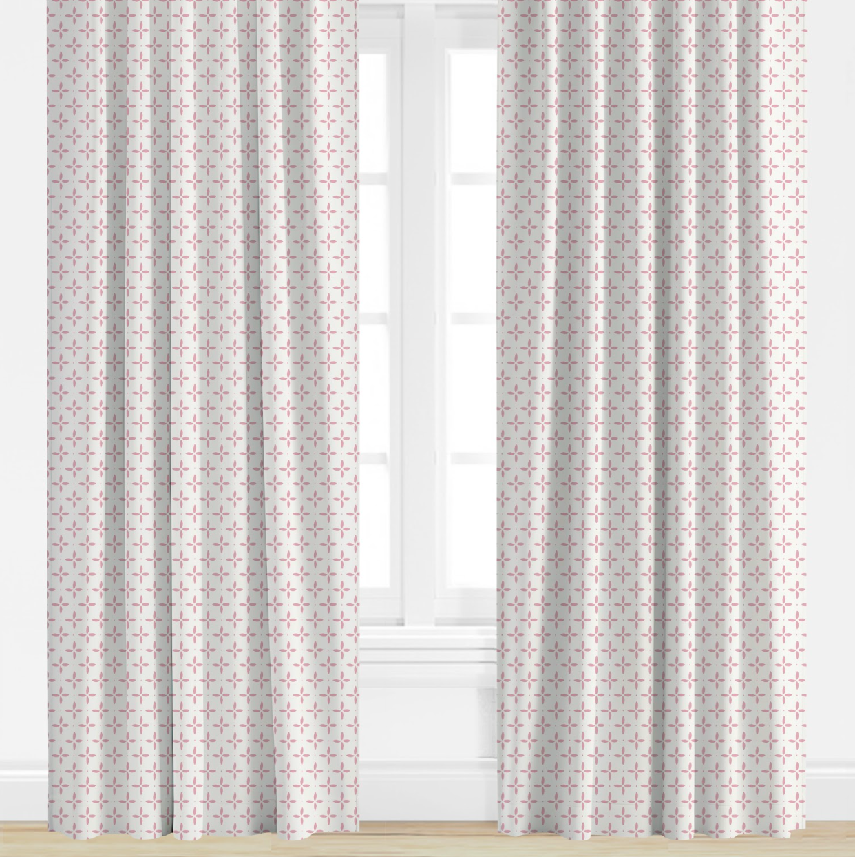 pink Patterned curtains on a window with a light background