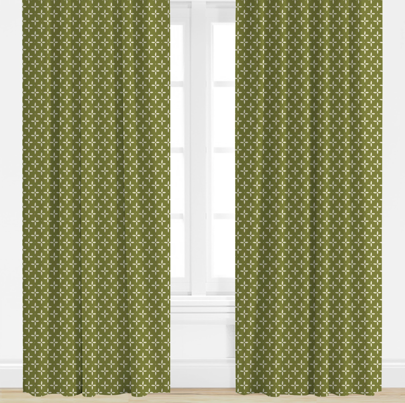 Green, star patterned curtains on a white window background