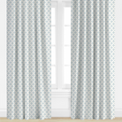 blue Patterned curtains on a window with a light background