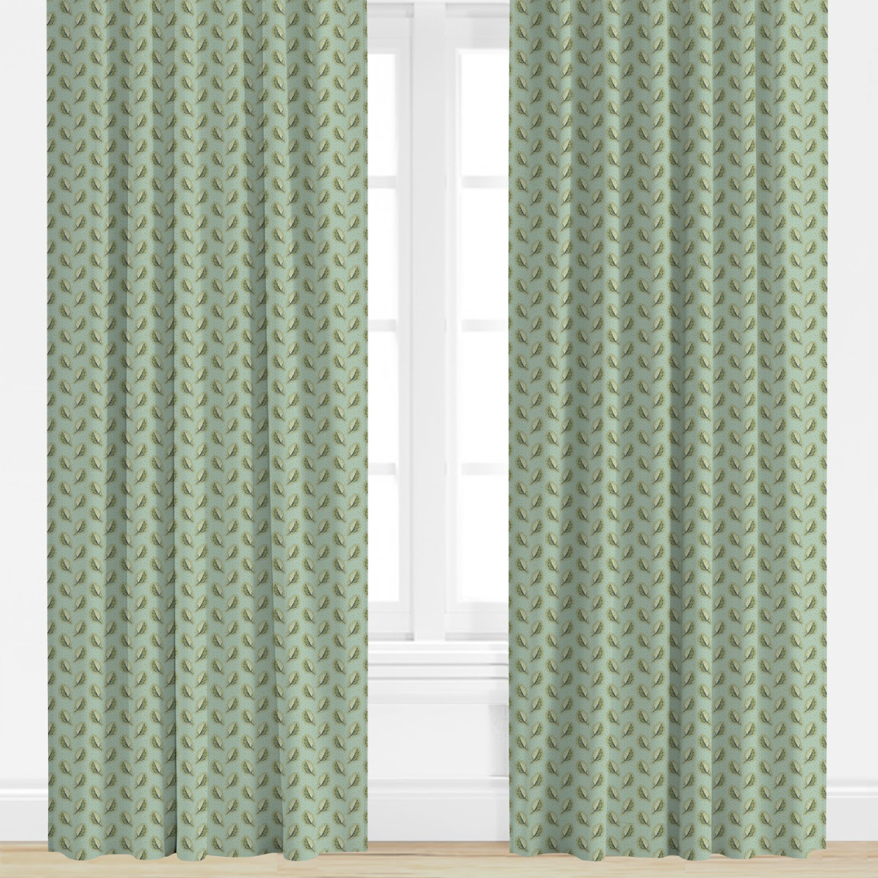 Green leaf patterned curtains on a window with a white background