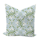 Decorative pillow with floral pattern on a light blue background