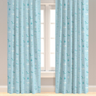 Puppy patterned drapery in blue